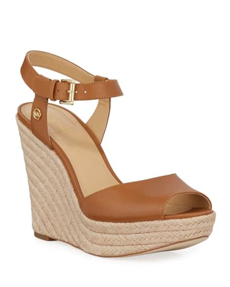 michael michael kors carlyn leather espadrille wedge sandals|Michael Kors gold flat sandals.